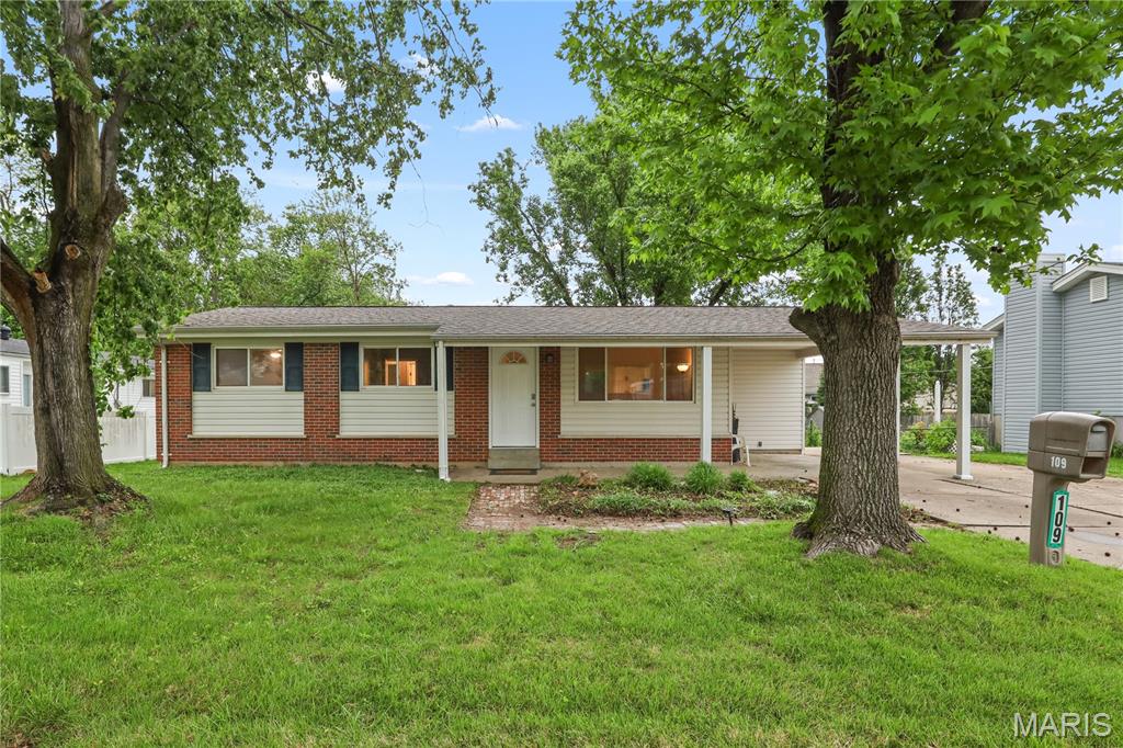 Welcome home to affordable luxury! This newly remodeled O'Fallon ranch features a new kitchen and bathrooms, fresh paint, refinished hardwood floors, updated lighting, a covered carport, and a comfortable deck overlooking the fenced yard. The kitchen offers new white cabinetry and counters, waterproof flooring, and brand-new stainless appliances that stay. Major improvements include a new roof, new water heater, and new electric panel. The full unfinished basement provides excellent storage, laundry/workspace area, or future finishing potential. No HOA!