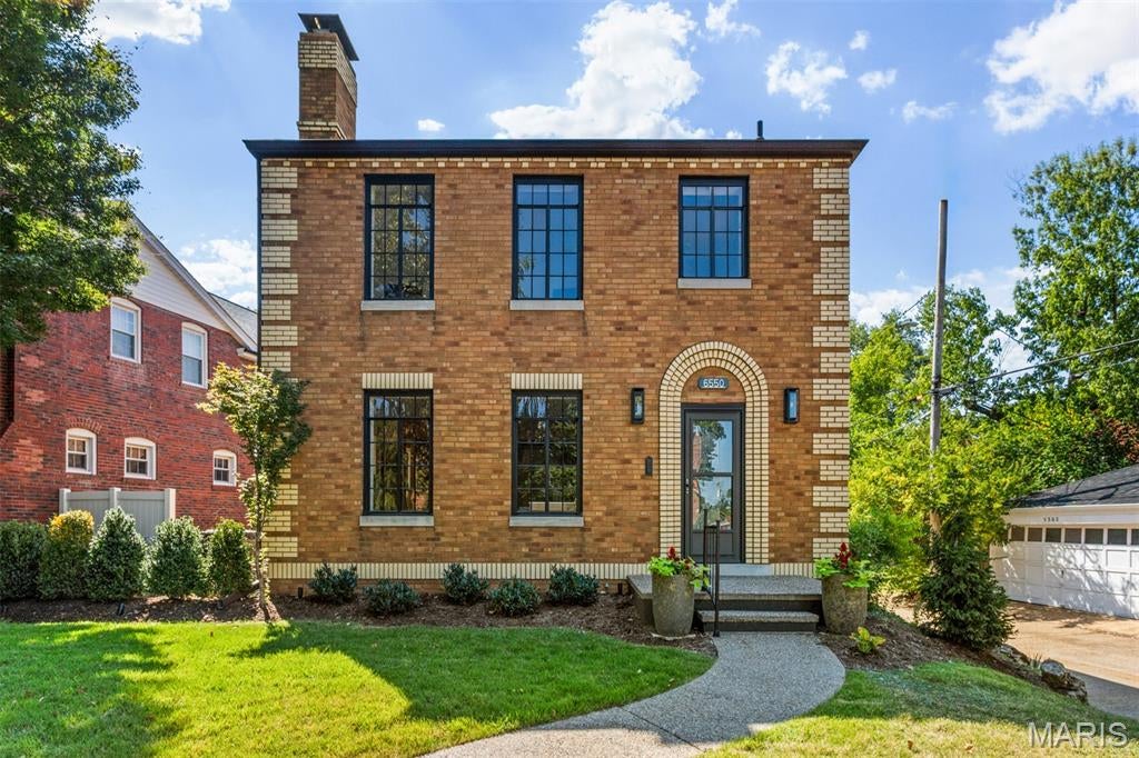 A rare opportunity in St. Louis Hills: finish a beautiful renovation and make it your own. 6650 Walsh has already undergone a thoughtful transformation, opening up the original floor plan for modern living while preserving the character of this classic brick home. The standout addition? A spacious main-floor primary suite with walk-in closet and gorgeous en suite bath—plus a main-floor laundry room—making this two-story home an ideal option for buyers looking for the convenience of one-level living.

The first floor now offers an open, natural flow between the new kitchen, dining room and inviting living room with stone fireplace, along with a convenient mudroom/laundry area with easy access to the two-car garage and backyard. Upstairs are three additional bedrooms and a brand-new full bath. The renovation is approximately 70% complete, giving the next owner the unique opportunity to choose many of the remaining finishes and put their own stamp on the home. To be clear: the list price of $725,000 is for a FINISHED home to include finishes chosen by you, within the contractor's budget. 

Much of the important work is already done, including updated plumbing, electrical service and 200-amp panel, attic insulation, updated windows, new/refinished flooring and new baths. The original steel casement windows, stained glass and leaded glass windows have been reglazed and restored, preserving a signature piece of the home’s historic charm. Outside, professional landscaping and landscape lighting add to the home’s curb appeal and make the property shine after dark.
One block to Francis Park and Rockwell Beer Garden...now you get to make it yours!