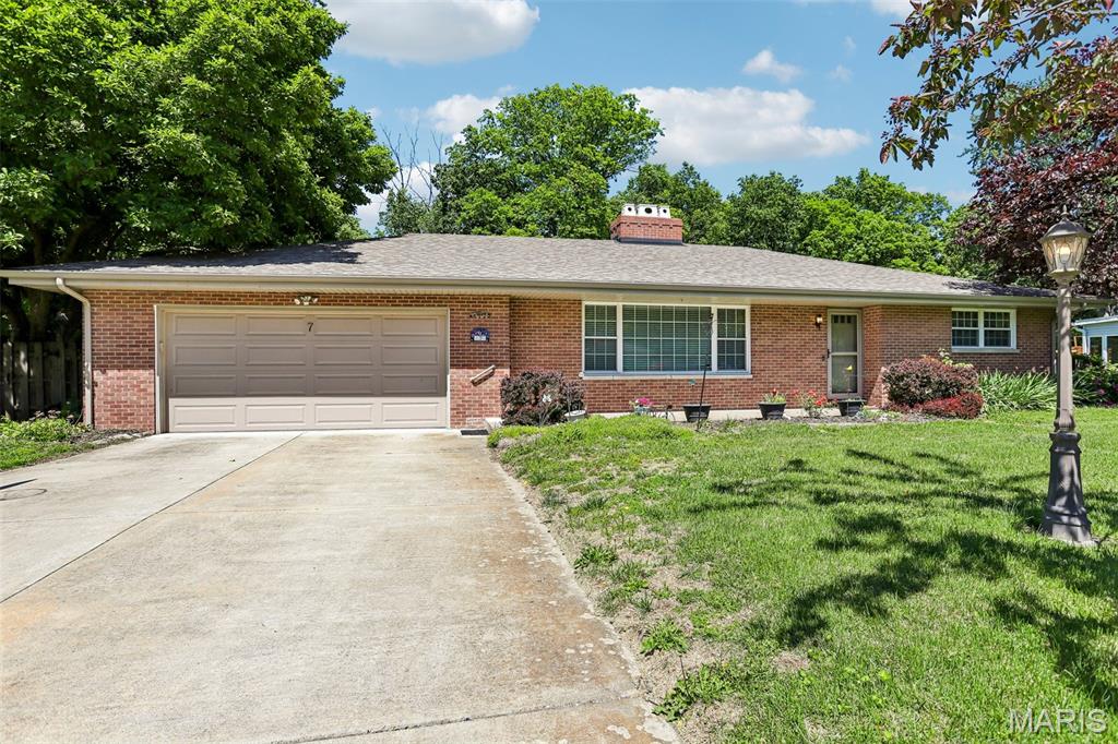 Quiet Comfort, Timeless Charm & Room to Make It Your Own! Nestled on a peaceful no-thru street in Glen Carbon, this all brick ranch offers the perfect blend of comfort, character, and convenience! Enjoy the confidence of recent seller improvements, including professionally completed basement wall reinforcement with a lifetime transferable warranty and electrical updates. Featuring 3 bedrooms, 2 baths (one full on main level and half bath in basement) , and an attached 2-car garage, this home welcomes you with warm natural light, cozy living spaces, and timeless charm throughout. The spacious living room and separate dining area provide plenty of room for gathering and entertaining, while the kitchen is highlighted by granite countertops, abundant cabinetry, and an eat-in area perfect for casual meals. Special touches including coffered ceilings, pocket doors, and beautiful millwork add character you don’t find every day. Currently being utilized as a family room, but could be used as a primary bedroom, the room has a wood-burning fireplace, the living room creates the perfect cozy atmosphere during cooler months. The full basement offers endless potential for living space, recreation areas, workshop space, or additional storage. Step outside to enjoy the serene backyard setting backing to mature trees, offering both privacy and a peaceful place to unwind. The shed in the back yard provides extra storage, hobby space, or workshop possibilities. Conveniently located near shopping, schools, dining, and major highways, this home combines quiet living with easy access to everything you need. Don’t miss your opportunity to make this charming property your next “Home Sweet Home!”