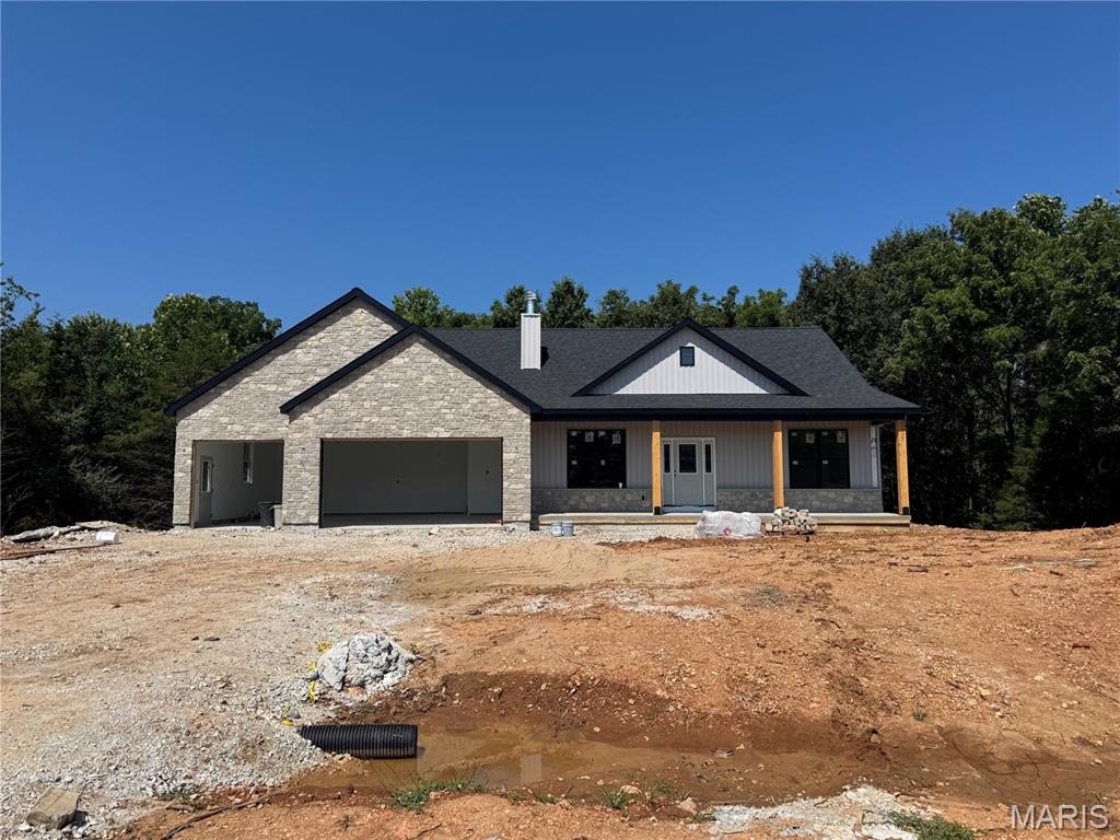 Welcome home to country living in Lincoln Counties newest subdivision Hickory Heits. Nestled in a family friendly small community is the Sierra model custom ranch home in extreme southern Lincoln county with early September completion date. Step inside to an open, inviting floor plan where everyone can stay connected while hosting guest, helping with homework, or keeping an eye on what's cooking. Your 1765 sq ft, 3 bedroom, 2 bath new home will impress your guests with the top notch finishes but more importantly it will be a great place for your family. The farmhouse style front of the home includes stone, maintenance free vertical vinyl and an enormous covered front porch to enjoy the evenings on. As soon as you enter the home you will notice the attention to detail, 9 ft main floor, wood burning fireplace, and the openness in the great room, kitchen, and dining room. The kitchen has soft close drawers and doors, granite countertops, and the full stainless steel appliance package. Just past the dining room is a sliding door that leads to a covered deck that overlooks the back yard and the trees behind the house. There is an open field beyond the trees for added area to play. The divided floor plan has the master bedroom on one end and bedrooms 2 and 3 on the other end. All bedrooms are a comfortable size with plenty of natural light. The primary bedroom suite is complete with the large marble shower and double vanity in the master bathroom that all leads to the large walk in closet. Plan for the future with the full 9 ft pour walkout basement that includes a bathroom rough in and plenty of options for finishing it down the road. The Sierra model is energy efficient with the Trane electric HVAC, blown-in insulation in the ceiling and double pane insulated windows. Enjoy parking your large vehicles and toys inside the oversized 28'x32' three car finished garage complete with garage door openers, keypad for easy entry, service door and plenty of natural light from the windows in both garage doors. Don't miss out on this high quality home in a great neighborhood. Builder has been told by Lincoln County that Patton Road will be paved this year. Hickory Heits Court will be hard surfaced after all 10 homes are complete.