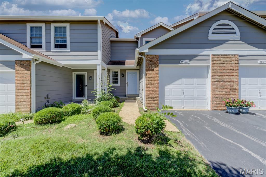 Open House Sat., 6/27, Noon-2 PM -Welcome home to this spacious 2-bedroom, 2-bath townhouse with an attached private garage, ideally situated amid expansive green space that creates a peaceful and inviting setting. Offering approximately 1,200 square feet of above-grade living space, the home features a comfortable open floor plan with a combined living and dining area that walks out to a wood deck overlooking a lovely, tranquil view—perfect for morning coffee or unwinding at the end of the day. Natural light fills the interior, enhancing the bright, welcoming atmosphere. Neutral decor, energy-efficient thermal windows, generous closet space, upgraded carpeting (2025), and practical updates throughout add to the home's appeal. While some future improvements may allow a new owner to build additional equity, the property already offers excellent value with updates that include newer toilets, dishwasher, lighting, vertical blinds, washer and dryer, water heater (2022), air conditioner (2019), furnace (2016), and garage door opener. The primary suite features a triple closet with an organization system and convenient access to a Jack-and-Jill bath. Walk-in closet in nicely sized secondary bedroom. The walk-out basement remains unfinished, providing abundant storage and excellent potential for future customization. Convenient access is available through either the front entrance or attached garage. The location offers easy access to major highways, shopping, dining, the Airport, community amenities, and 2,145 acre Creve Coeur Lake. Residents enjoy a well-maintained community featuring a swimming pool, clubhouse, tennis courts, scenic lakes, and expansive common grounds. Combining space, value, updates, and future potential, this townhouse presents an attractive opportunity for buyers seeking comfort, convenience, and room to make a home their own.