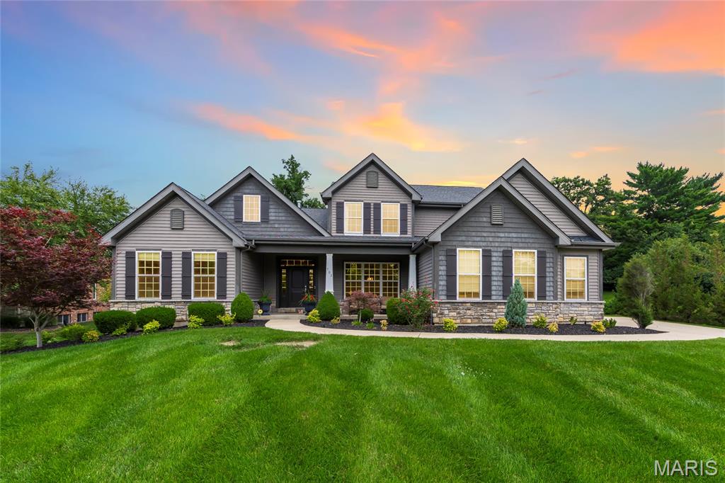 Stunning 9-year-old custom built 1.5-story home, situated on beautiful .89-acre lot, in the desirable Bellecoeur subdivision– Top Rated Parkway School District. This 4 bedroom – 3.5 bath showplace has over 3824 sqft of living space, boasts an extremely functional, and open floor plan, designed for today’s living and entertaining, with high-end finishes throughout, custom moldings, and is painted in stylish, neutral colors, making it truly move-in ready. You will be wowed from the moment you enter the foyer, and you will know you are home. 1st floor features a formal dining room with wainscoting, a separate living room, both with crown molding and large windows, a fantastic den / study / office with French doors, an awesome family room, with tray ceiling, a wall of windows bringing the outside in, and gas fireplace with custom mantle and surround, flanked by arched alcoves, a lovely powder room, an incredible gourmet eat-in kitchen with, custom cabinetry, lighting, granite counter tops, tiled backsplash, contrasting color center island / breakfast bar, pantry, and high-end stainless steel appliances, including 6-burner gas cooktop with custom hood & fridge, opening to a bright & airy, vaulted hearth room, with floor to ceiling stone fireplace (gas), a Butler’s pantry with granite counters tops, and wine fridge, and a main floor laundry / utility room, with custom cabinetry. If that is not enough, there is a spacious master retreat with tray ceiling, custom organized walk-in closets, and a luxurious bath with separate walk-in, a designer stand-alone tub, and a large double vanity, with makeup counter. Walk up the handcrafted staircase to the 2nd floor, which features a terrific loft, and 3 large bedrooms, 2 sharing a Jack & Jill bath, the other en-suite, with its own full bath. Other features include zoned HVAC, gleaming hardwood floors, custom moldings & lighting, an attached, oversized 3-car garage, irrigation system, just to name a few. The deep pour lower level could easily be finished with a legal 5th bedroom (egress window), full bath, large rec room, home theatre, fitness room or home office, still leaving plenty of unfinished storage space. Relax on the expansive stamped concrete patio, with pergola, after a long day and enjoy the spacious, fully fenced yard, or sip your morning coffee on the charming covered front porch! This home is amazing for entertaining family and friends! Location could not better - near major hospitals, and convenient to shopping, restaurants, county parks, as well as close by to Bellerive Country Club, and many of St. Louis’s finest private schools, including MICDS, CBC, DeSmet, Chaminade, Whitfield, Westminster, Villa Duchesne, and Visitation Academy high schools – easy access to major highways.