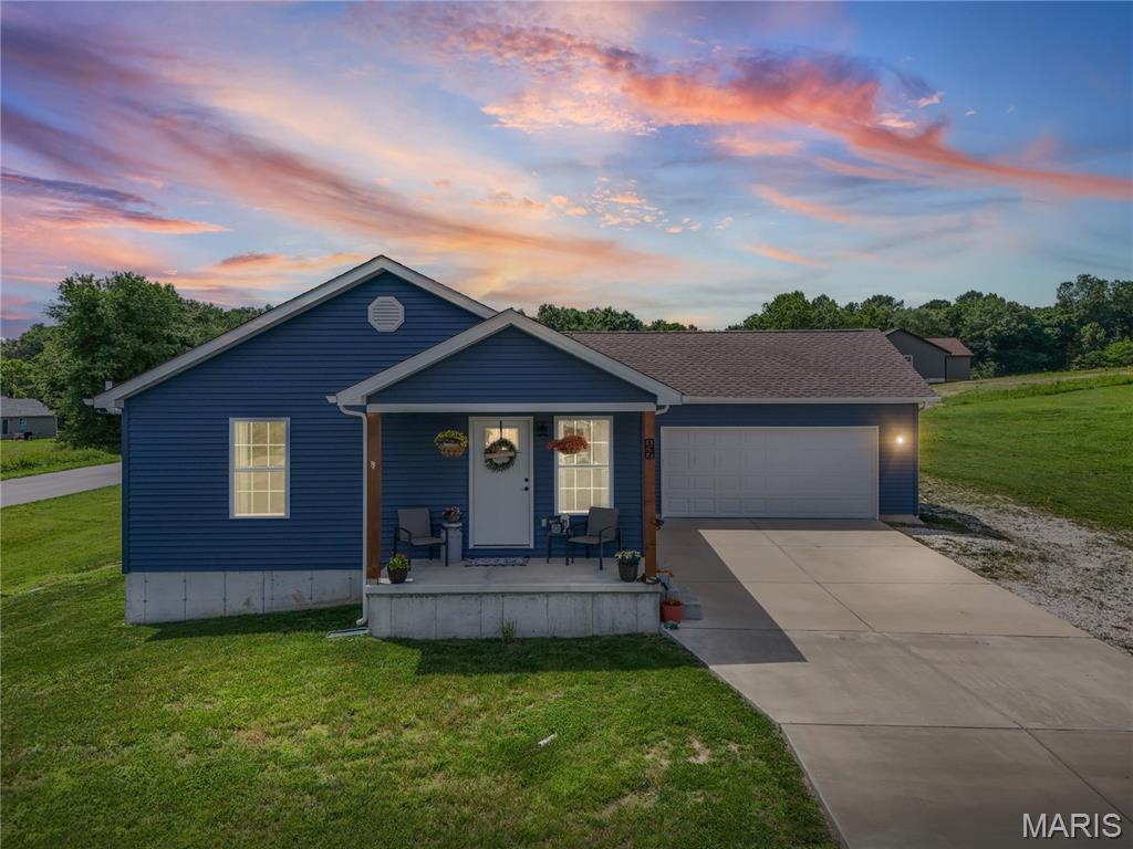 Welcome home! Located just minutes from the state park, this beautiful ranch-style home offers the perfect blend of comfort and convenience. The open-concept kitchen, dining, and living areas create an inviting space that’s ideal for entertaining family and friends.

This home features 3 spacious bedrooms, 2 full bathrooms, and a 2-car garage, providing plenty of room for everyday living. The large basement offers endless possibilities, whether you need extra storage, a home gym, or the ultimate man cave.

Situated on a spacious corner lot of just over half an acre, there’s plenty of outdoor space to enjoy. The backyard patio is perfect for summer BBQs and relaxing evenings. Inside, you’ll love the beautiful LVP flooring that flows throughout the home, adding both style and durability.

Don’t miss your chance to own this move-in-ready gem in a fantastic location!