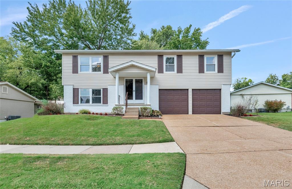 Welcome to 6205 Brogan Dale Circle—a meticulously maintained, move-in-ready home tucked away on a quiet cul-de-sac in desirable South St. Louis County. This inviting 3-bedroom, 2-bath home offers an ideal blend of comfortable everyday living and exceptional outdoor space, with a large, level 0.27-acre lot and an expansive deck perfect for entertaining, relaxing, or enjoying the outdoors. The main level features three bedrooms, including a spacious primary suite with its own private bath, while the lower level adds valuable living flexibility with a generous family/rec room, walk-out access to the backyard, and abundant storage. An oversized, extra-deep two-car garage provides room for vehicles, projects, hobbies, and additional storage. Newer roof and HVAC systems add peace of mind, while the convenient location puts Suson Park, Eagle Springs Golf Course, shopping, dining, and medical services along Tesson Ferry Road close at hand. With its combination of space, privacy, functionality, updates, and a fantastic location, this is the kind of home that deserves to be at the top of your must-see list—schedule your showing before it's gone! This is a must see today.