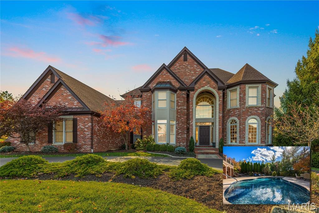 Located on a spacious lot with breathtaking views, this completely updated 1.5-story residence impresses at every turn. The heart of the home is an open kitchen and hearth room, thoughtfully designed for both entertaining and everyday living. A serene main-floor primary suite boasts a newly remodeled bath, while the main level also offers a private office, formal dining room, and elegant living room. Each bedroom includes a bath, and the thoughtfully finished lower level adds exceptional versatility. Step outside to enjoy the updated pool and tranquil setting. This is a rare opportunity for luxury living with privacy.