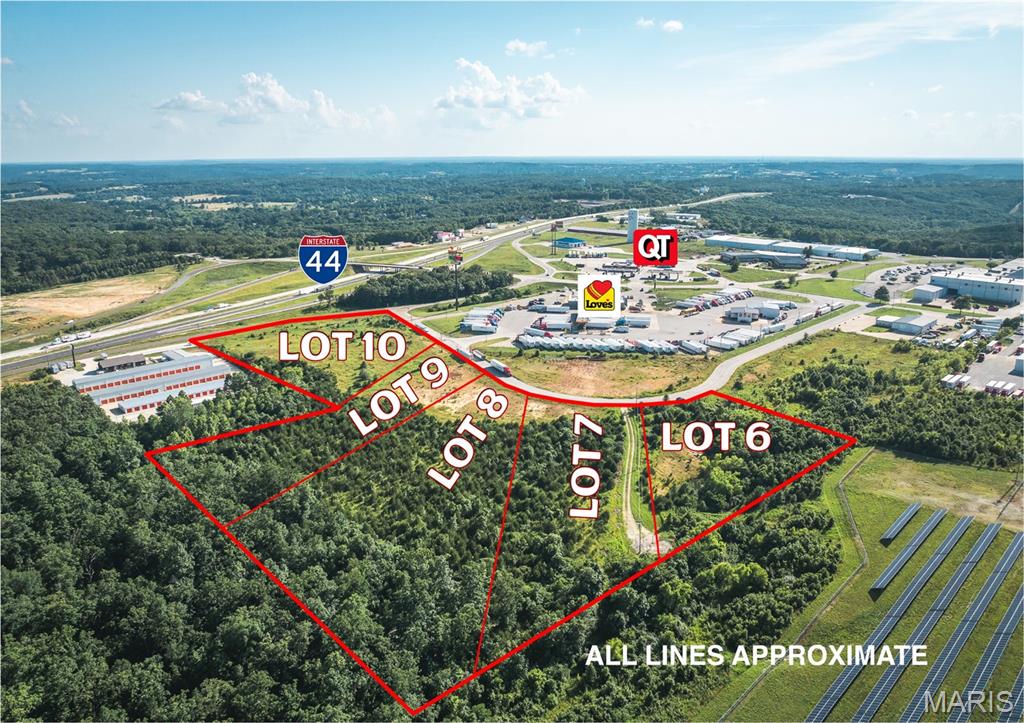 This exceptional real estate parcel is positioned right alongside Love's Travel Stop, McDonald's, Subway, and conveniently, a QuickTrip is just across the road. Its location grants excellent visibility from I-44 and is located just off of exit 189. Adjacent to an industrial park, this property offers an attractive prospect for development. Its exceptional location makes it a compelling option for a variety of commercial endeavors. With its favorable placement and proximity to amenities, this property has the potential to generate substantial returns for developers. Some restrictions apply. Additional lots are available! Location: City