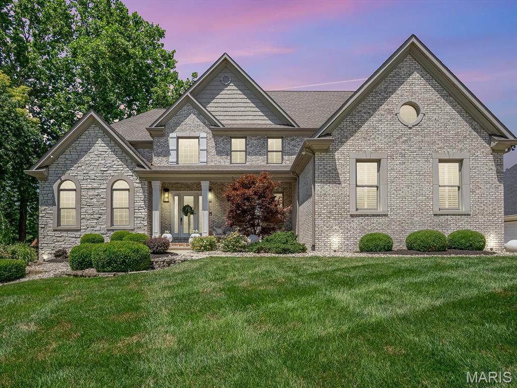 Step into refined elegance and resort-style living in this extraordinary six-bedroom, six-bath estate, perfectly positioned on the 13th fairway of Sunset Hills Golf Course in the highly sought-after Edwardsville School District. This 1.5-story masterpiece showcases timeless design and modern updates throughout, offering both sophistication and comfort at every turn. A grand two-story foyer sets the tone, flanked by a private office and an elegant dining room, while a dramatic wall of windows fills the great room with natural light and sweeping golf course views. The chef’s kitchen is thoughtfully designed with expansive workspace, high-end finishes, and a walk-in pantry, seamlessly connecting to a warm and inviting hearth room accented by stunning wood beams and access to a covered porch—perfect for year-round enjoyment. The main-level primary suite is a true retreat, featuring a luxurious bath and a custom-designed walk-in closet. Upstairs, you’ll find three spacious bedrooms, a bonus room, two full baths, and a convenient second laundry area. The finished walk-out lower level offers exceptional versatility with a full bar, family room, game area, two additional bedrooms, a full bath, another laundry space, and ample storage. Outdoors, indulge in your own private oasis with an in-ground salt water pool, fire pit, and expansive patio—all set across two lots totaling .760 acre within the prestigious Sunset Hills Estates subdivision. With close proximity to top-rated schools, shopping, and interstates, this home offers the perfect blend of luxury, location, and lifestyle. Custom features abound—ask your agent for the full list and discover the unmatched opportunity this remarkable home provides.