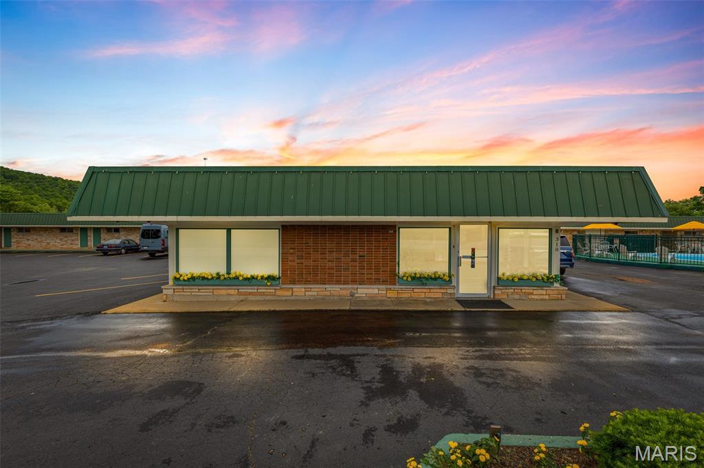 Charming Hotel in the Heart of Missouri’s Beautiful Arcadia Valley! Location, History & Adventure — All in One Investment! Nestled in scenic Arcadia Valley, this well-maintained hotel offers a rare chance to own a piece of hospitality heritage in one of Missouri’s most picturesque and adventure-rich regions. Prime Location: Directly across from the historic Fort Davidson State Historic Site, and steps from new mountain biking and hiking trails. A short drive takes you to Johnson’s Shut-Ins, Elephant Rocks, and Taum Sauk Mountain. Property Highlights: 22 guest rooms • Onsite Manager’s suite • Office/reception area • Outdoor swimming pool • High-visibility location on a major route • Growth potential through upgrades or expansions. With rising interest in outdoor and heritage tourism, this is a turnkey business with strong upside in a charming, welcoming community.