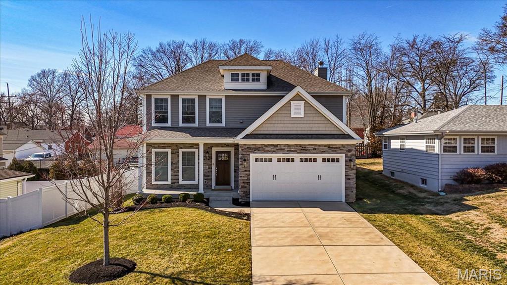 Welcome to 1025 Barry Ct — a stunning newer construction home tucked onto a quiet cul-de-sac in the heart of Kirkwood. Offering 3,420 sq ft of total living space, this 5-bedroom, 3.5-bath two-story blends thoughtful design, elevated finishes, and everyday functionality. The open floor plan is ideal for both entertaining and daily living. The main level features 9’ ceilings, rich hardwood floors, and custom crown molding and millwork throughout. The sun-filled family room and kitchen combination is the heart of the home, centered around a beautiful gas fireplace with custom mantle and a dramatic wall of windows overlooking the private, fenced backyard. The chef’s kitchen shines with 42” white cabinetry, quartz countertops, and stainless KitchenAid appliances, creating a space that is both stylish and highly functional. Just off the garage entry, built-in cubbies and a mudroom keep life organized, while a versatile flex room off the family room is perfect for a home office kids’ homework workstation. Upstairs, enjoy the convenience of second-floor laundry and retreat to the luxurious primary suite featuring two custom walk-in closets and a spa-like bath. Three additional bedrooms and a full bath complete this floor. The finished lower level provides exceptional bonus living space, including a fifth bedroom, full bath, and generous storage. Very gently lived in, this home truly feels like new — an incredible opportunity in one of Kirkwood’s most desirable locations.