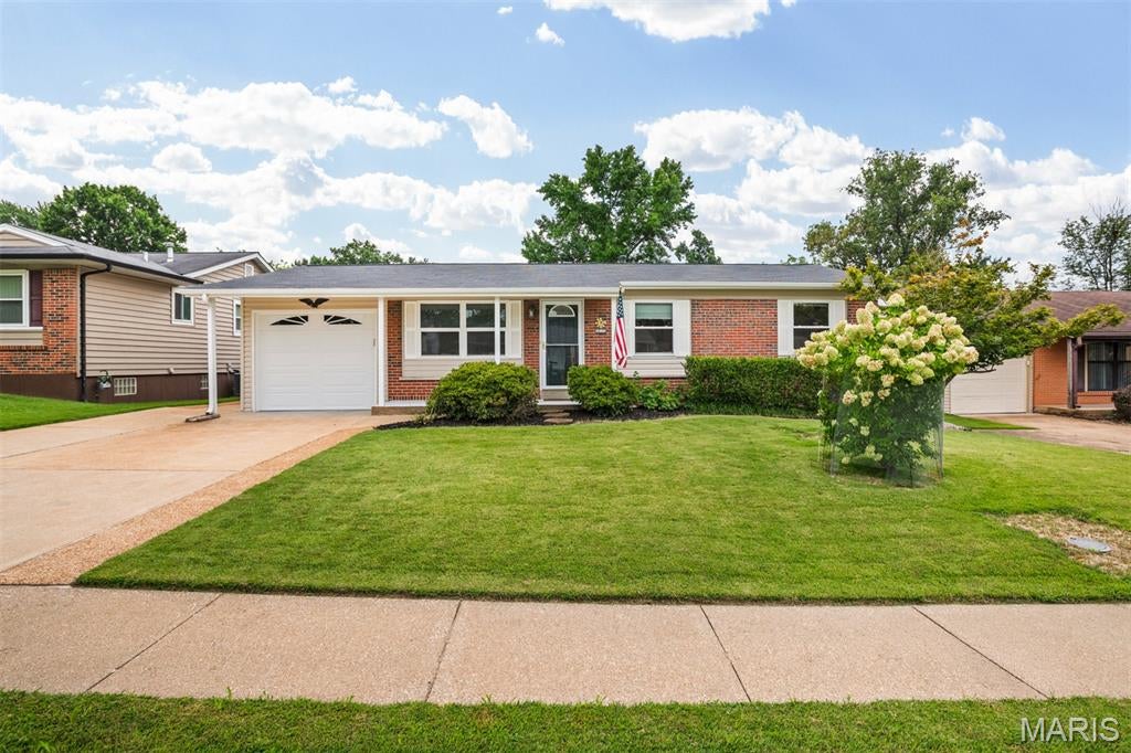 Well maintained 3 bedroom Ranch, 1-1/2 baths, updated eat-in kitchen with appliances, ice maker, gleaming hardwood floors through-out.  Located in sought after Parkway School District....Oversized 1 car attached garage and double-wide driveway.
Lower level is partially finished with a 12 x35 Recreation Room,  laundry and plenty of storage area.  Walk-out to the patio and beautiful in ground salt water Swimming Pool.  Step out of the kitchen and there is a  Low Maintenance Composite Deck over looking the pool and landscaped yard. See this MOVE-IN READY lovely home today.