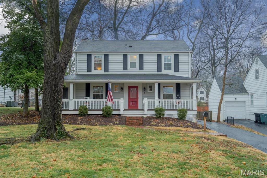 Situated on a very sought-after street in Kirkwood, this 2-story home has been consistently updated. You will find a wraparound front porch, an amazing kitchen, baths, hardwood floors throughout . Beautiful foyer staircase, bath, office on main level could be 5th bedroom. The kitchen boasts stainless steel appliances, quartz counters, 42” distressed ivory cabinetry. Dining room & into Family/Living room with arched openings. Sliders lead to fully fenced yard w/exposed aggregate patio & detached 2-car garage. The family/living room has wood burning fireplace & access to screened porch. The 2nd floor offers the master bedroom +3 more bdrms & 2 full bths both updated recently. A laundry room w/utility sink is in the LL & workshop/hobby room & custom playhouse This well-maintained home is just a walk to Downtown Kirkwood and has access to highways, shopping, restaurants and more.