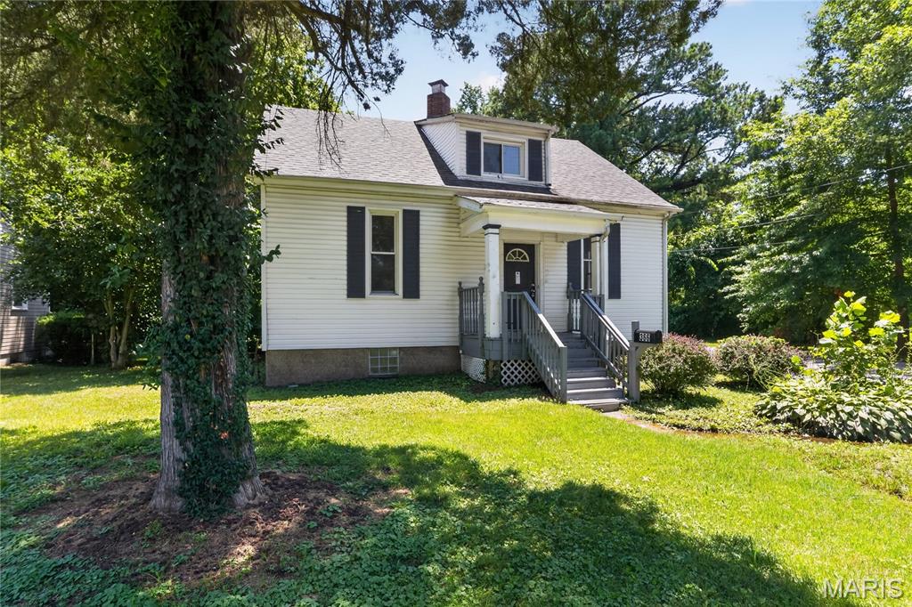 Discover the potential of this charming, historic residence located in the heart of Ferguson. This home offers a unique opportunity, featuring a spacious floor plan with a traditional layout and the added benefit of a large 0.63-acre lot. Enjoy a bright main level with three comfortable bedrooms and a full bath, plus a versatile, partially finished basement that includes an additional full bathroom and three flexible rooms. Situated in a prime location with easy access to community amenities.
