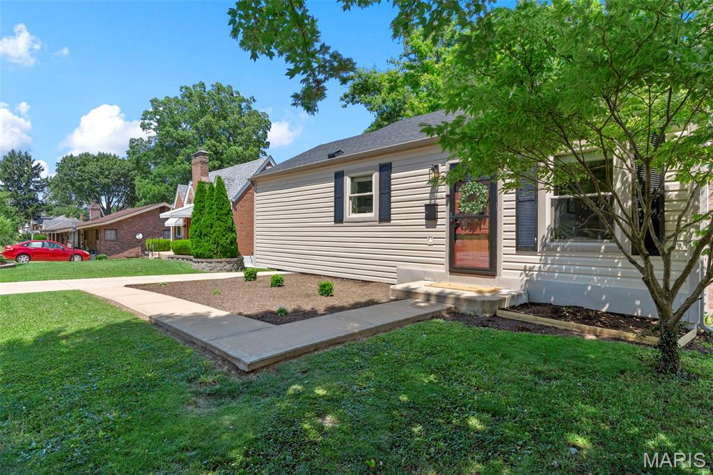 This is the home you've been waiting for. From the moment you walk in, you'll appreciate the quality craftsmanship and thoughtful updates throughout. Beautiful hardwood floors, custom woodwork, and elegant uplighting create a warm and inviting atmosphere.

The stunning chef's kitchen is truly the heart of the home, featuring stainless steel appliances, granite countertops, abundant cabinetry, and an oversized breakfast bar that's perfect for casual meals, entertaining, or gathering with family and friends.

The inviting living room offers a cozy gas fireplace, custom built in shelving, and rich hardwood floors that continue throughout the main level. Two spacious bedrooms and an updated full bathroom complete the main floor.

The finished walkout basement provides exceptional additional living space with a large family room, a versatile bonus room that works perfectly as a home office, guest room, or fitness space, a second full bathroom, and an oversized utility room with incredible storage.

Step outside to enjoy the expansive, level, fully fenced backyard, offering plenty of room for kids, pets, gardening, or outdoor games. The large deck and patio create the perfect setting for summer barbecues, morning coffee, or relaxing evenings with friends and family.

Major updates provide added peace of mind, including a brand new roof installed in 2025, a new HVAC system installed in 2023, and a new electrical panel installed in 2023.

Located in the heart of Affton, this move in ready home offers convenient access to major highways, shopping, restaurants, parks, and everyday amenities while combining modern updates, exceptional storage, and timeless character.

Don't miss your chance to make this beautiful home your own. Stop by the open house on Thursday 7/9 from 5:00pm-7:00pm