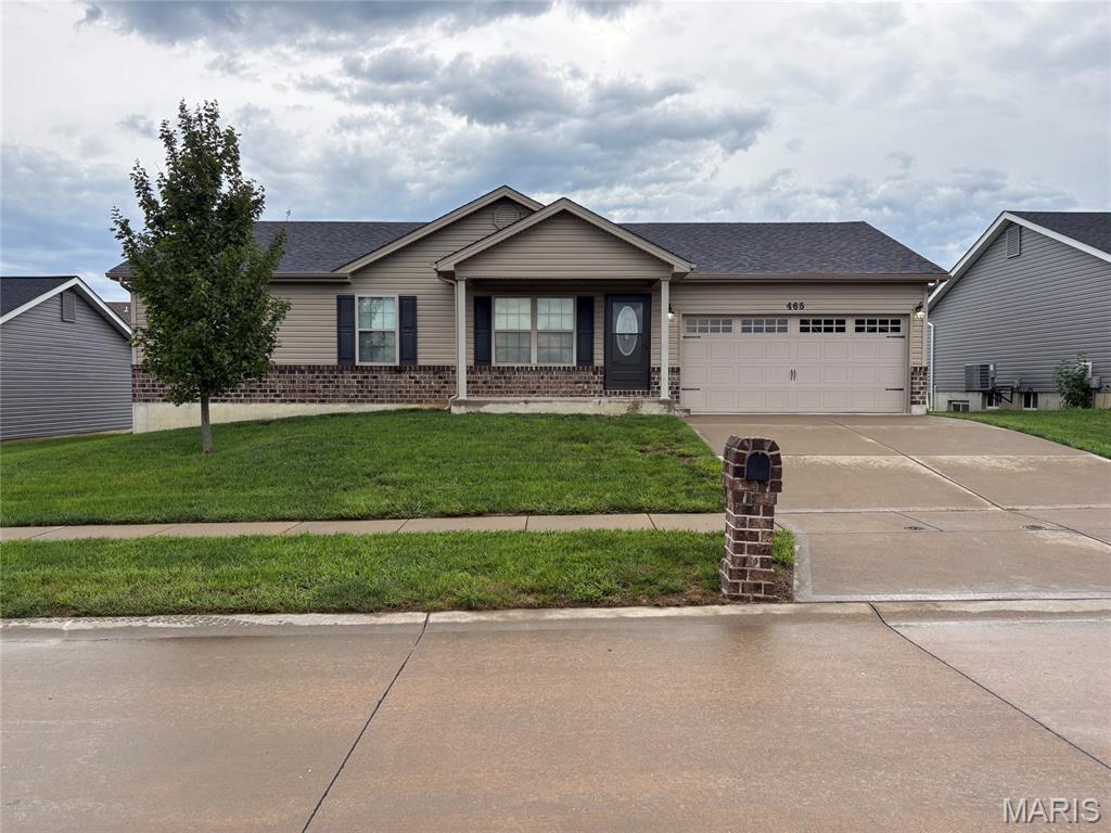 This newer 3 bedroom, 2 bath home has every upgrade you could imagine! They include vaulted ceilings, rounded corners, granite counter tops, all new stainless steel appliances, maple cabinets with "soft close", ceramic tile (in kitchen, laundry, baths), custom neutral colored paint job throughout, framed windows, taller baseboards, adult sized cabinets in bathrooms with marble counter tops, walk-in closets, upgraded carriage doors on an oversized 2-car garage with openers, brick mailboxes, 6 panel doors, and upgraded water/light fixtures throughout the house!