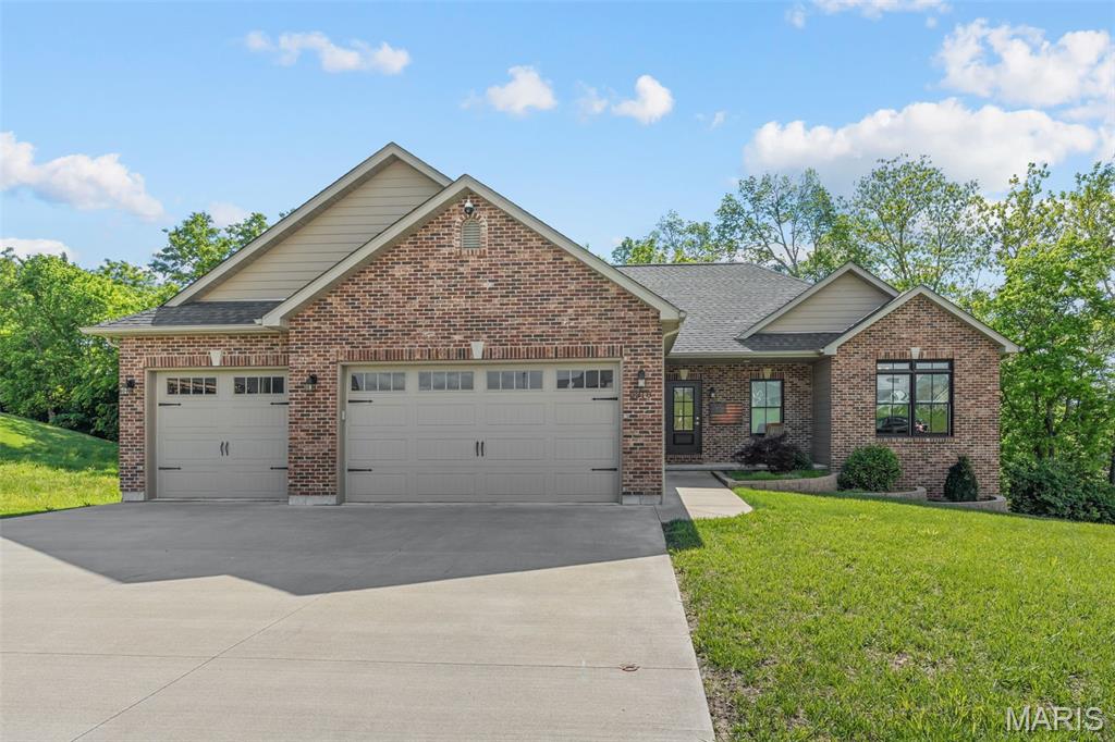 This beautifully updated home has been thoughtfully enhanced since its 2018 build, offering comfort, style, and versatility throughout. The luxurious primary bath has been transformed into a true personal oasis with a soaking tub, stunning new tile, and heated towel racks.

The kitchen is both functional and stylish, featuring a gas stove and updated backsplash. The finished lower level offers incredible flexibility as an entertainment space or private in-law suite, complete with a bedroom, full bath with a heated bidet seat, media room, and full kitchen.

Additional upgrades include  radiant heated floors designed to keep you warm and comfortable during the colder months. Situated on a quiet cul-de-sac lot with a tree-lined backdrop for added privacy, this home combines modern convenience with exceptional comfort.
