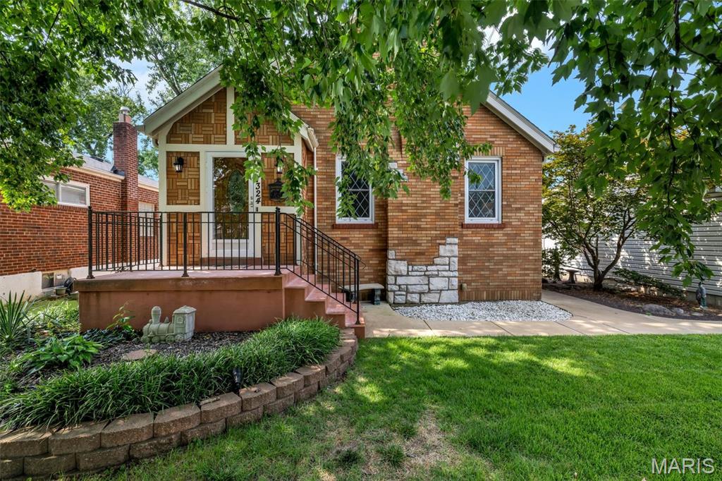 Welcome to this charming 1.5-story brick home in Shrewsbury, a desirable community known for its friendly neighbors and a variety of nearby amenities. Enjoy easy access to numerous shops, restaurants, entertainment venues, convenient highways, the Metrolink, and Shrewsbury Center—all just minutes away! Take a leisurely stroll to Wehner Park, which offers a range of activities, including a picturesque tree-lined walking path. Unique to the area and perfect for car enthusiasts, hobbyists, or contractors, this home features an impressive 30 x 24 three-car garage! There's more!  Enter the home to find a beautiful interior filled with charm and character galore, blending original features with modern conveniences. The open living and dining areas create the perfect space for gatherings, whether by the inviting fireplace or around the dining table with family and friends. The nicely updated kitchen boasts attractive white cabinetry with soft-close drawers, granite countertops, stainless steel appliances, and a center island breakfast bar. You'll love the adjoining breakfast room, which leads to a private, fenced yard featuring a lovely patio for outdoor entertaining, a charming cottage playhouse, and a 12 x 14 lofted shed that offers endless possibilities for use as a home studio, storage, or workshop—it's up to you!  Back inside, the main level includes two spacious bedrooms and a full bath. The 2nd floor features the second full bath and two generously sized bedrooms, along with a versatile en-suite bonus room that could serve as a nursery, reading nook, or walk-in closet. Additionally, the partially finished lower level provides extra living space, a laundry area, and ample storage space.  Whole-house backup generator, Roof on house, garage, shed, and playhouse new in 2025...