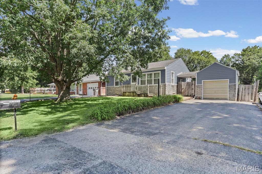 Priced to sell! This 3-bedroom, 2-bath home in a convenient Belleville location is ready for you to call it home. Enjoy your backyard with a beautiful in-ground pool, perfect for beating the summer heat and entertaining family and friends.15 X 30 (chlorine) pool is about 3 1/2 and slopes to 6 1/2 with walking edge. This home has great bones and is ready for updates to fit your taste. The primary suite features a large bedroom with vaulted ceilings and a charming bay window. Downstairs offers a cozy wood-burning fireplace and a bar area, ideal for entertaining. Recent updates provide peace of mind: new HVAC (2024), new hot water heater (2020), new siding and gutters (2025), new skylights in both bathrooms (2025), new washer and dryer, and a new side porch (2023). Enjoy the covered patio behind the one-car garage, plus a storage shed in the fenced backyard. Flooring and cosmetic updates needed throughout, bring your vision and make this house your own!