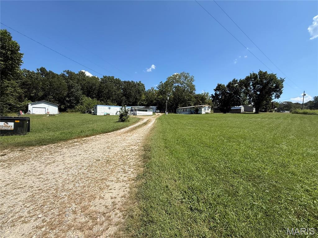 Investment Opportunity located on 15.30 acres just outside of Fredericktown. This property comes with access to Lost Valley Lake. It features 3 mobile homes, garage, 2 septics and a well. With a little bit of work, this could be a good cash flow property.