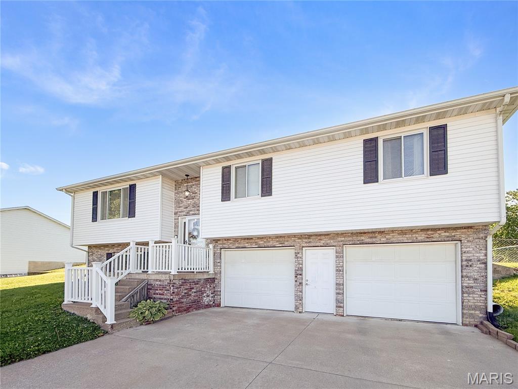 Welcome to this spacious and completely move-in ready split-level home offering 3 bedrooms, 2.5 baths, and over 2,300 square feet of finished living space! This well-maintained home features numerous updates throughout including brand new carpet, an updated kitchen with new appliances, new ceiling fans, and a beautifully remodeled primary bathroom with a walk-in shower. The HVAC system is less than 2 years old, and the roof is only 3 years old, offering added peace of mind for the next owner. The functional split-level layout provides multiple living spaces with plenty of room to spread out, entertain, or enjoy everyday living. Outside, you’ll find a fully fenced backyard complete with an above-ground pool—perfect for relaxing or hosting this summer. Conveniently located close to schools, shopping, and local amenities, this home combines updated features, space, and convenience all in one package.