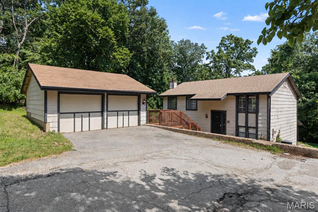 GREAT HOUSE!!! This is an awesome opportunity for a handy homeowner to make this place their own and build some serious equity along the way. The home offers a great layout, tons of natural light, and the kind of upside that is getting harder and harder to find. 4 bedrooms with a primary suite, lots of living and dining area and a blank slate for you to finish it out just how you'd like. Step out back and picture yourself enjoying morning coffee, grilling with friends, watching the game outside, or just relaxing under the HUGE covered patio while overlooking the peaceful wooded area behind the home. You also get a BIG 2-car garage and a private setting that feels tucked away while still being close to everything. Did I mention? ROCKWOOD SCHOOLS!!! Bring your vision, make the updates you want, and turn this into a truly special home. THIS WONT LAST LONG!!! DON'T MISS YOUR OPPORTUNITY!!! SCHEDULE A SHOWING TODAY!!!