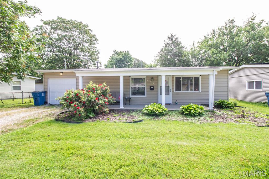 Check out this adorable ranch situated on the outskirts of town! As you walk up to this home, you are greeted by a lovely covered front porch that leads you inside to the spacious living room! Flowing right into the eat-in kitchen, you will find ample cabinet and counter space! 2 great sized bedrooms, full bathroom, and laundry area round off the interior. Kickback and relax this summer on the patio overlooking the large, fenced yard! 1 car attached garage. This home conveniently offers everything on one level. Call for your private showing today! Buyer to verify all MLS data.