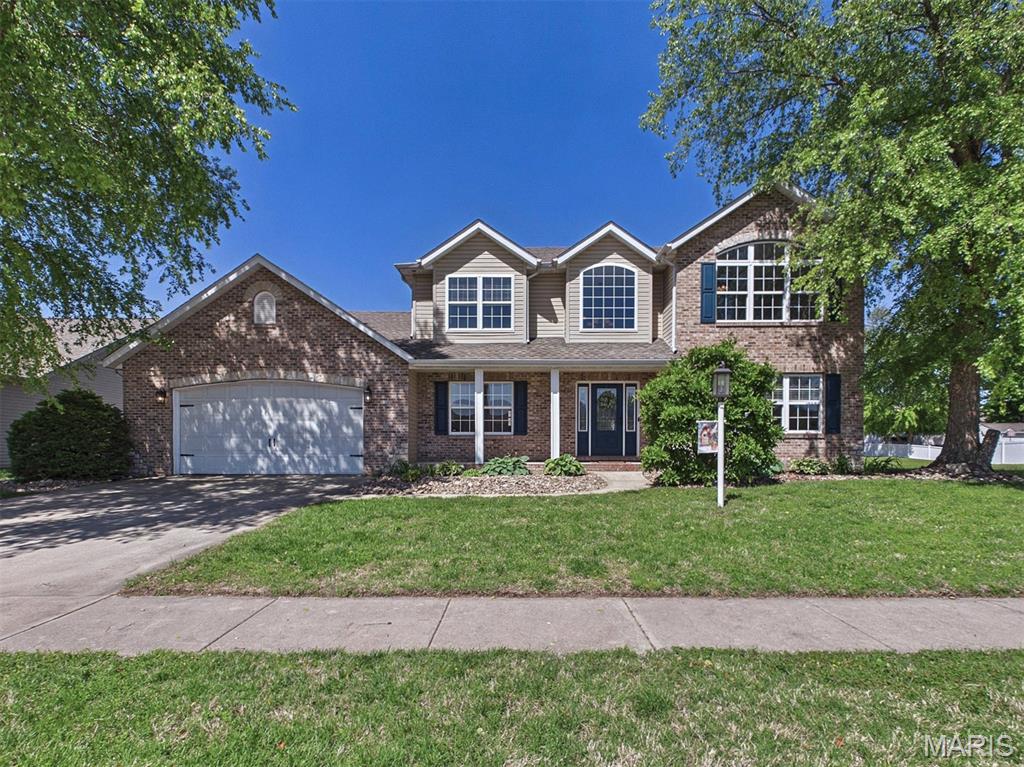 Fall in love with this beautiful two-story home in Donnalynne Legacy! A bright, airy main level offers a 2-story entry, living room, hearth room with fireplace, formal dining room and half bath. Main floor laundry with a drop zone - perfect for shoes, coats and backpacks. Open kitchen with breakfast bar and pantry. All kitchen appliances stay - plus washer & dryer. Enjoy the screened in porch off the kitchen - ideal for relaxing & entertaining - take in the spacious backyard with a privacy fence, concrete patio and raised garden bed. The upper level offers 2 spacious secondary bedrooms, full bath and primary suite. The primary suite is large and includes a walk in closet, double vanity, separate shower and tub. Unfinished basement with plenty of storage and endless possibilities - includes rough-in for a bathroom. You’ll love the OVERSIZED two car garage - has a bump out for extra storage or space for the golf cart you always wanted. More updates include Roof 2020, hot water heater 2026. Dual -zoned heating and cooling. Welcome Home!