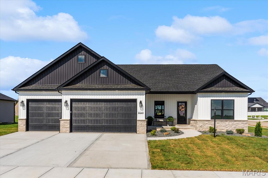 New construction in Glen Carbon’s popular Savannah Crossing, ready now. Five bedrooms, three bathrooms, three-car garage, finished basement, open floor plan, and covered patio. This stunning new home built by Coda Construction is located in one of the most sought-after neighborhoods in Glen Carbon, Illinois with the perfect blend of style, functionality, and location. This ranch offers one of the smartest floor plans in the area. Just past the entry foyer, the airy living room impresses with a tray ceiling, elegant archways, and a striking 3-fireplace feature wall. The large kitchen boasts stunning granite countertops, stainless steel appliances, ample designer cabinetry with under-cabinet lighting, and a massive center island overlooking the living room and the cheery dining room with sliding doors to an oversized covered patio with ceiling fan to watch the sunset. A custom drop zone coming in from the garage keeps you organized every day. The luxurious primary suite features a custom tiled walk-in shower with lighted shower niche, dual vanities, a generous walk-in closet, and a convenient secret access to the laundry room. Two additional bedrooms and a full bath complete the main level. The finished lower level offers two more bedrooms or home offices with walk-in closets, a third full bath, and a huge family room, while still providing the ever-coveted additional storage space. Additional highlights include luxury vinyl plank flooring, plush carpet, and an energy recovery ventilation (ERV) system for clean indoor air and improved energy efficiency. Life in Savannah Crossing means easy access to the Madison County Bike Trail system just a block away, top-rated Edwardsville schools, easy commuting with I-55, I-70, and I-270 all nearby, shopping, and restaurants. One-year builder home warranty included. If you have been dreaming of a spacious new home in this beloved neighborhood, this fantastic new find is your chance.