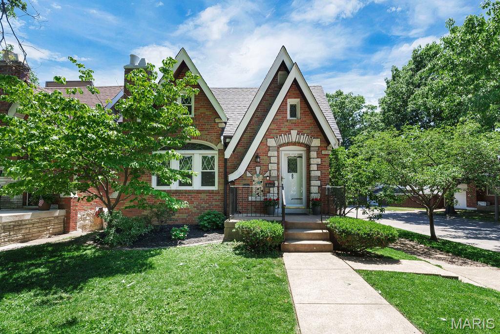 Enchanting character and functionality shine throughout this 1.5-story, all-brick 1930s Gingerbread/Tudor-style home. Nestled in the heart of Southampton, this 1,600+ sq. ft. home is sure to please — from the original stained glass windows, welcoming entry foyer, and formal dining room to the decorative archways, intricate millwork, antique sconces, classic molding, stone mantel, and recently refinished hardwood floors that add timeless charm throughout. The main level offers two spacious bedrooms and a tastefully updated full bathroom complete with ceramic tile flooring, subway tile shower surround, custom built-in shelving, and a porcelain shower base. The primary bedroom keeps everyday living effortless, while the secondary bedroom offers flexibility as a guest room, office, nursery, or additional storage space. The updated kitchen blends vintage character with modern functionality— featuring quartz countertops, custom cabinetry with crown molding, subway tile backsplash, stainless steel appliances, and a charming garden window with backyard access tying it all together. Upstairs, an open-concept flex space with an additional full bath is ready for whatever your next chapter calls for — a home office, guest suite, playroom, creative studio, or all three over time. Adaptable space that evolves right alongside your lifestyle. Situated on a corner lot, the fenced backyard features a spacious deck and a veggie garden already planted and waiting for you. Outdoor oasis with privacy or the perfect entertainment space—this backyard has it all. Updates include a new roof, new gutters, newer windows, tuck pointing, new water heater, and a sealed basement with exterior walk-up access — making this home as solid as it is soulful. This desirable Southampton location is hard to beat with its tree-lined, walkable streets, beloved South City coffee shops and locally owned retail, and less than a mile from Francis Park. STL City Occupancy done and ready for move-in! Some homes are just houses. This one’s a gem — and it’s been waiting for you.

**** OPEN HOUSE CANCELLED ****

Virtual Tour: https://my.matterport.com/show?play=1&lang=en-US&m=38nVSftxLbF