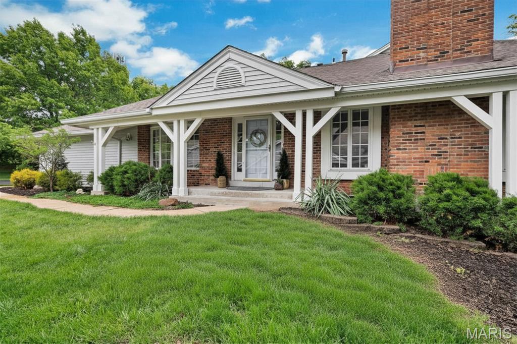 Discover lakeside luxury at 14932 Manor Lake Drive, a meticulously updated 4BD/3.5BA end-unit villa in the Manors of Broadmoor. The move-in-ready interior features a beautiful kitchen with granite countertops & stainless appliances, as well as fresh paint & alluring flooring throughout. Enjoy effortless living with a main-floor owners suite with newly renovated custom bathroom & a spacious great room with a gas fireplace that opens to a deck overlooking the water. Upstairs holds two bedrooms each with spacious closets & a shared hall bath. The walk-out lower level offers a large family room with a second fireplace, a custom 4th bedroom or home office, & direct patio access to the lake. Views of the lake can be found in FOUR rooms of this amazing home! Benefit from low-maintenance living as the association covers exterior care, while you enjoy community amenities like the pool, pickleball courts, & clubhouse. Make "lake house" views part of your daily routine in the heart of Chesterfield!