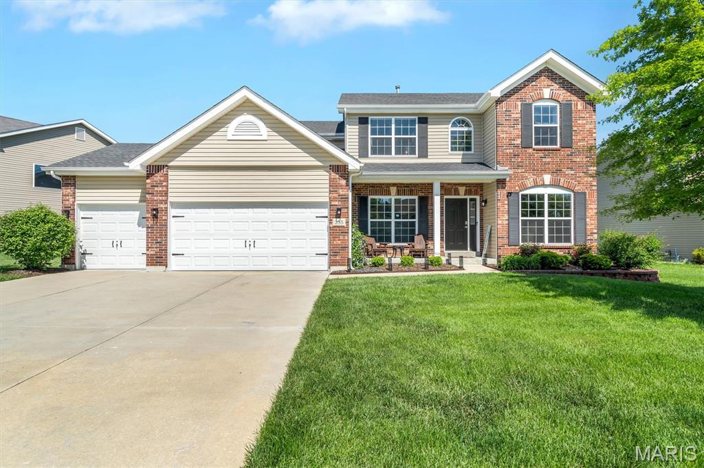 Elevated design and effortless functionality come together in this beautifully upgraded, move-in ready 5 bed, 3.5 bath home located within the highly sought-after Wentzville School District. A light-filled, open-concept layout with 9ft ceilings creates a seamless flow between the kitchen, breakfast room, and inviting family room with fireplace—perfectly suited for both everyday living and stylish entertaining. Upstairs, four generously sized bedrooms offer comfort and privacy, highlighted by a stunning primary suite designed as a true retreat. Featuring coffered ceilings, an expansive walk-in closet with shelving system, and a spa-inspired bath with soaking tub, walk-in shower, and dual vanities, it delivers a refined, relaxing escape. As a bonus, there is updated flooring throughout most of the home. The main level is thoughtfully designed with a formal dining room and a private office/living room, offering flexibility for gatherings, work, and daily life. At the heart of the home, the Chef’s kitchen makes a statement with a large center island, granite countertops, stainless steel appliances, and 42-inch cabinetry. The professionally finished lower level expands your living space with a spacious recreation area, fifth bedroom with egress, and a full bath—ideal for guests, in-laws, or additional living quarters. Complete with a three-car garage and dual HVAC systems for optimal comfort and efficiency, this home blends luxury, space, and livability in a prime location. Let's not forget about the updated front door and beautiful landscaping! Close to shopping, dining and schools!