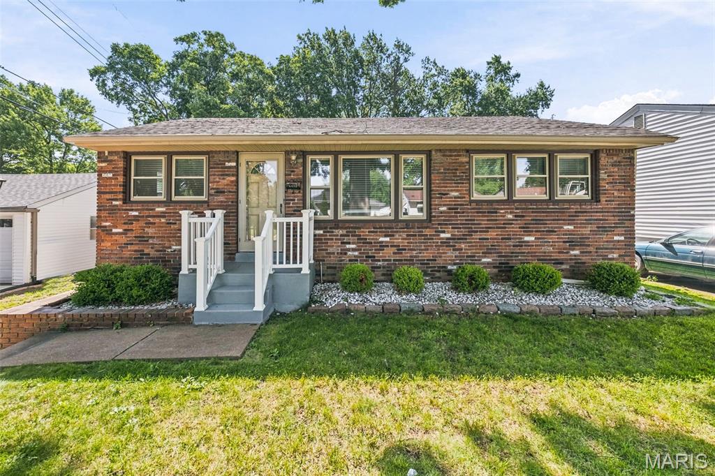 Welcome home to this charming 3 bed, 2 bath ranch, ideally located just minutes from the airport! This well-maintained home also features a detached 2-car garage, a privacy-fenced backyard, and a partially finished basement. When you step through the front door, you are greeted to a bright and inviting living room filled with natural light and beautiful hardwood floors. The kitchen offers nicely painted cabinetry, a gas range, and durable vinyl flooring, creating a functional and welcoming space for everyday living. Just off of the kitchen, the back door opens to a brick patio overlooking the fully privacy-fenced backyard, perfect for relaxing, entertaining, or enjoying outdoor activities with friends & family. The main level is complete with 3 bedrooms, all with hardwood flooring, and a full bathroom. The partially finished lower level expands the living space with luxury vinyl plank flooring throughout, featuring a spacious recreation room, an additional sleeping area, a second full bathroom, and abundant storage. Outside, the driveway provides ample off-street parking in addition to the detached 2-car garage. Don't miss your opportunity to make this move-in-ready home your own—schedule your private showing today! 
**Could be a fantastic buy and hold / investment opportunity as well, it had just been previously rented out for $1,700 per month**