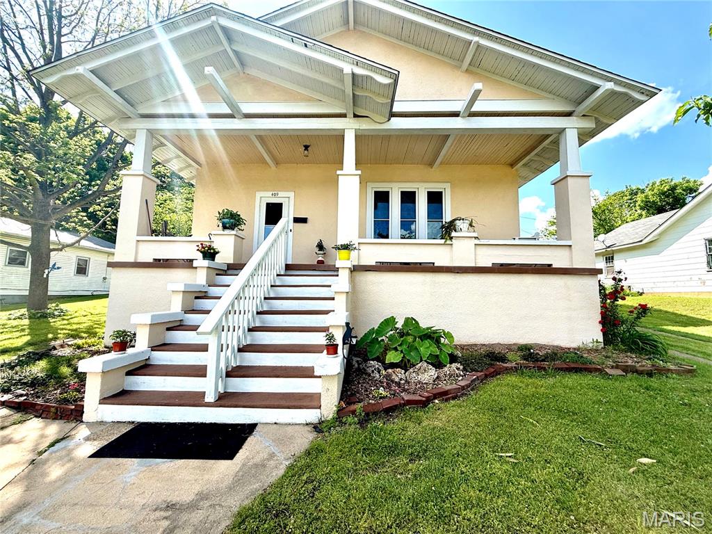 Step into timeless charm with this beautifully maintained 3 bed 1 1/2 bath Craftsman style home just minutes from the lake. Brimming with warmth and character, this home stands tall and bright, boasting a front porch you wont want to leave. Inside you will find rich hardwood floors flowing throughout the home and original trim both adding elegance and durability. Long windows fill the home with natural light creating an airy and welcoming atmosphere ideal for relaxing and entertaining. Extra convenience with the laundry and main bedroom on the main floor yet you still have plenty of storage in the basement with one wall lined with floor to ceiling cabinets. Upstairs you will find 2 bedroom along with a quaint nook for reading or homework, and a bonus room for added storage or extra sleeping area. The home is located just a short distance from Clearwater Lake, Sam A. Baker State Park, and several other natural areas you are sure to enjoy exploring.  With many updates and new windows (2015) and roof (2021) this home is move in ready!!