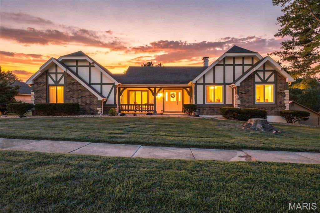 Welcome home to this beautifully updated atrium ranch where walls of windows fill the home with natural light and showcase the dramatic open staircase and vaulted ceilings. With 4 spacious bedrooms and 3 full baths, this versatile floor plan offers two possible primary suites, perfect for multi-generational living or hosting guests. Gather around one of two cozy woodburning fireplaces, entertain in the formal dining room, or enjoy game days and celebrations in the lower-level wet bar area. The luxurious main-floor primary suite features an ensuite bath and generous walk-in closet, while the convenience of laundry facilities on both levels makes everyday living effortless. Step outside to a large deck and lower-level patio, ideal for morning coffee or evening relaxation. Freshly renovated from top to bottom with new flooring, updated baths, new light fixtures, new appliances, fresh paint, and professional landscaping, this home is move-in ready and tucked away on a desirable cul-de-sac. Plus, a substantial unfinished area provides endless possibilities to create the space you've always dreamed of. You've earned it - Schedule your showing today and make this remarkable house your next home!