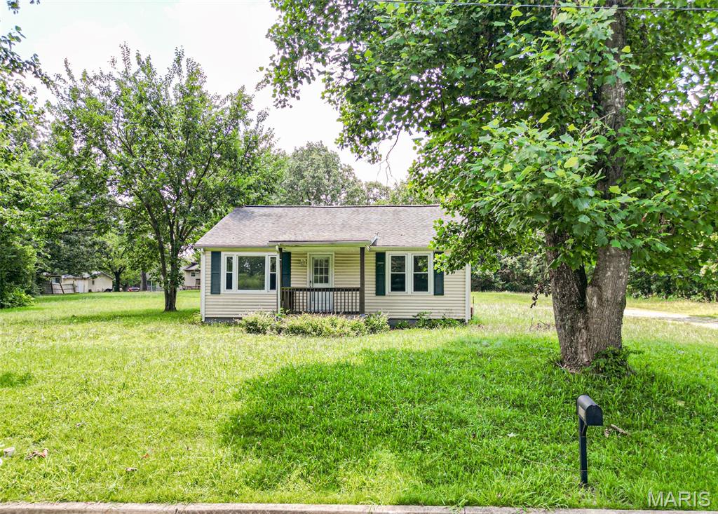 This quaint home is full of potential and just waiting for the right owner to bring it back to life. With some TLC, this property could make an excellent first home, or rental.

The home features 2 bedrooms + 1 bathroom, and a large detached two-car garage/outbuilding, all situated on over half an acre corner lot. 
The spacious lot offers plenty of room to expand, build, or create your ideal outdoor space.

Conveniently located just blocks from Walmart, restaurants, gas stations, and everyday amenities, you'll enjoy the perfect combination of affordability and accessibility.

So if you're looking for your next project, this property is worth a look. Call today to get started!