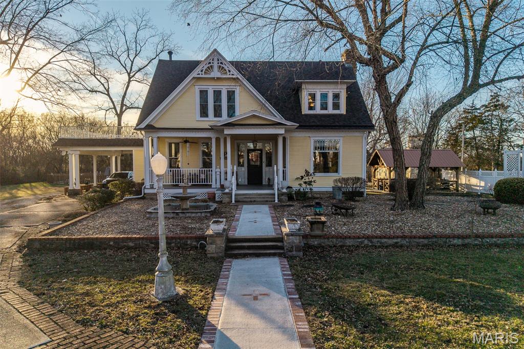 A rare opportunity to own a historic home in the Lebanon area offering over 3,500 sq. ft. of living space, featuring 4 bedrooms and 3.5 baths. Beautifully situated on approximately 20 picturesque acres, this property is rich in character and timeless charm. Outdoor amenities include a pool with separate pool house, detached garage, mature fruit trees, the original ice house, and a charming doll house/playhouse. A peaceful pond provides the perfect spot for fishing or quiet relaxation. The expansive additional acreage offers potential for future development or expansion, subject to zoning and approvals. This one-of-a-kind property blends history, privacy, and opportunity—just minutes from town.