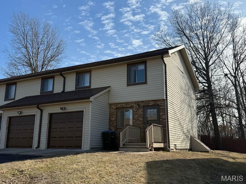 This town home located close to AT Still University and Northeast Missouri Regional Hospital is renovated and move-in-ready. An end unit, this home has two bedrooms, one and a half baths, in-unit laundry and an attached garage. The complex also has had exterior updates including new garage doors, new roofs and new front porches. A great investment opportunity. Currently Leased through 5/31/26, $1010/month; also available Unit 901.