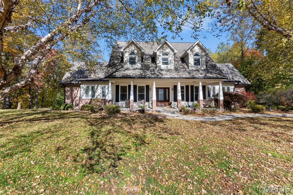 3.5-acre wooded lot • Inground pool • Detached garage with workshop • Main-level living • Birch hardwood floors

Set on 3.5 wooded acres in a quiet Benton neighborhood, this 1.5-story home offers the ideal mix of space, privacy, and modern comfort. Inside, the main level features an open, functional layout designed for everyday living as well as entertaining. The large living room flows seamlessly into the dining area and kitchen, where granite countertops, a walk-in pantry, and a huge island create a true gathering space. Birch hardwood floors extend throughout the main level, adding warmth and timeless style, while high ceilings enhance the home’s spacious feel.

This home includes 5 bedrooms and 5 full bathrooms, providing flexibility for guests, offices, or multigenerational living. The primary suite is located on the main level for convenience. Also on the main floor is a super cool man cave—an ideal spot for watching the game, relaxing, or hosting friends. 

The finished lower level expands the home’s versatility with an additional living room, bedrooms, bathroom, storage space, a dog bathing station, and a small kitchen area. This level walks out directly to the pool deck, creating a seamless indoor-outdoor connection ideal for entertaining or extended stays.

Step outside to enjoy your private backyard retreat with an inground pool, concrete patio, and wooded backdrop for added privacy. A two-car attached garage provides everyday convenience, while a detached garage adds extra space for storage, a workshop, or hobby use.

Located just minutes from Benton’s center and Interstate 55, this property combines country privacy with neighborhood ease. Experience open living spaces, outdoor enjoyment, and a versatile floor plan—all in one exceptional 3.5-acre setting. Listed at $849,000.