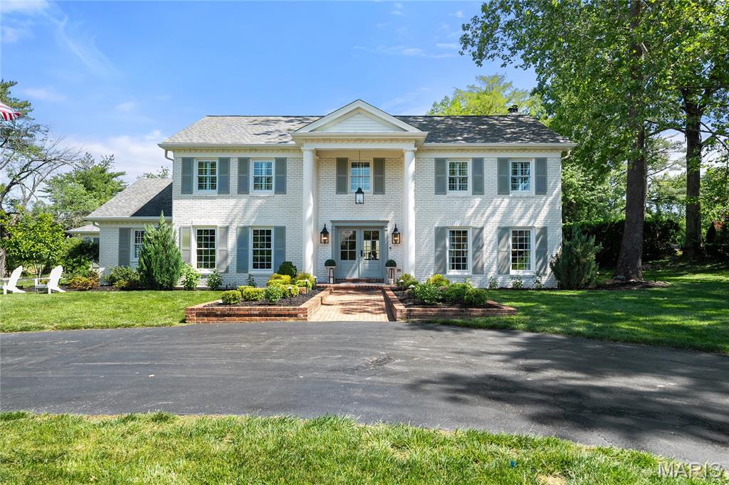 Gracefully reimagined & lovingly restored, this Frontenac gem on a 1-acre lot is where timeless elegance meets modern luxury. From the moment you arrive, you’ll feel the warmth & intention in every detail. Beyond the stunning main home lies a fully renovated, one-of-a-kind pool house you have to see to believe. Inside, a grand foyer opens to a formal dining rm & a striking wet bar lounge w/ built-in fridge, freezer, & dishwasher—perfect for entertaining. The custom kitchen is a culinary dream, featuring double-thick marble counters, handcrafted cabinetry, top-tier appliances incl. a Miele coffee system & Fisher & Paykel drawer dishwasher. Expansive new windows fill the airy, recently opened layout with natural light, custom picture moulding throughout, & a back entryway feat. high-end built-ins w ample storage incl Locker Rm. Upstairs are 4 serene bedrooms, each with Private, bespoke updated baths & Custom Closets. The primary suite is a Sanctuary, offering a new spa-like bath & dream walk-in closet. The fin LL includes a media rm & play rm, Cedar Closet, & abundant storage. Step outside to the private paradise—a sparkling pool surrounded by multiple entertaining areas: a built-in fire pit w flagstone patio, gazebo, all adorned w lush landscaping. The pool house features a full kitchen, bath, laundry, bedrm, screened patio, & its own 2-car garage—mirroring the attached 2-car garage of the main home. Beyond the pool area lies expansive, flat green space for play & leisure.