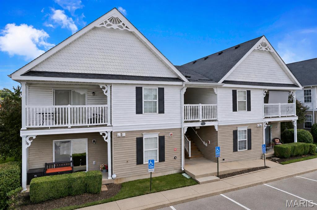 Move right into this beautifully updated 2-bedroom, 2-bath condo located on the second floor, where vaulted ceilings throughout create a bright, open, and spacious feel. This well-designed home features a light-filled living and dining room combination, a functional kitchen with a convenient breakfast bar, newer appliances, updated kitchen and bathroom faucets, and plenty of cabinet space.

Recent updates include luxury vinyl plank flooring, new blinds, and smart home features such as a smart thermostat, smart smoke detector, and video doorbell. A full-size washer and dryer are also included for added convenience. Step through the sliding glass doors to your private balcony, the perfect place to enjoy your morning coffee or unwind in the evening.

Assigned parking is conveniently allotted by building, with numerous additional parking spaces available for residents and guests. The beautifully maintained community offers exceptional amenities, including a sparkling swimming pool, tennis court, and basketball court.

Ideally located near shopping, dining, parks, and major highways, this move-in-ready condo is perfect for first-time buyers, downsizers, or investors. For added peace of mind- seller is providing a home warranty. Don't miss this fantastic opportunity!
