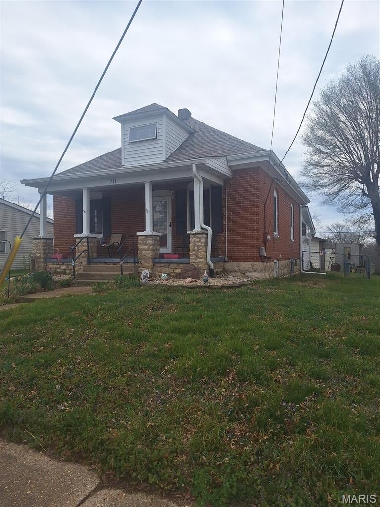 This is a Short Sale -Investor Opportunity - Home offers generous living space- Home needs updating and repairs   Main level has one bedroom, full bath, living room and kitchen. Opens to a large sun room. Upper level has a half bath and 2 irregular shaped rooms with closets - may be small bedrooms - slanted ceilings limit standing up in part of the rooms. Fenced yard, oversized 2 car garage, 8x8 shed. No utilities are on or will be turned on. Bring a flashlight - well lit from natural lighting during daylight hours. Some items will be left in the home. They become your treasures. Register and show.