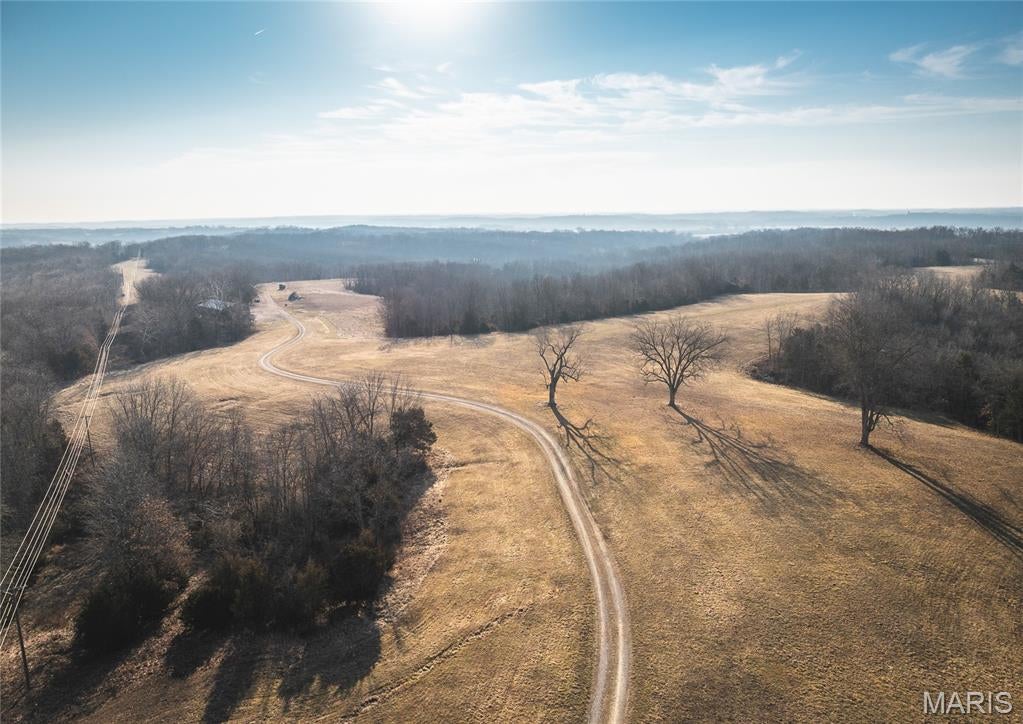 Check out this 25 +/- acre lot that sits right up the road from Railwood Golf Center.  This lot has some open ground and wooded ground that gives the best of both worlds.  Electric and water are available making this lot readily available to build your dream home on.  Lots in a convenient location with a country feel are hard to come by.  Just a short drive to Jeff City and Holts Summit. Come take a look today.