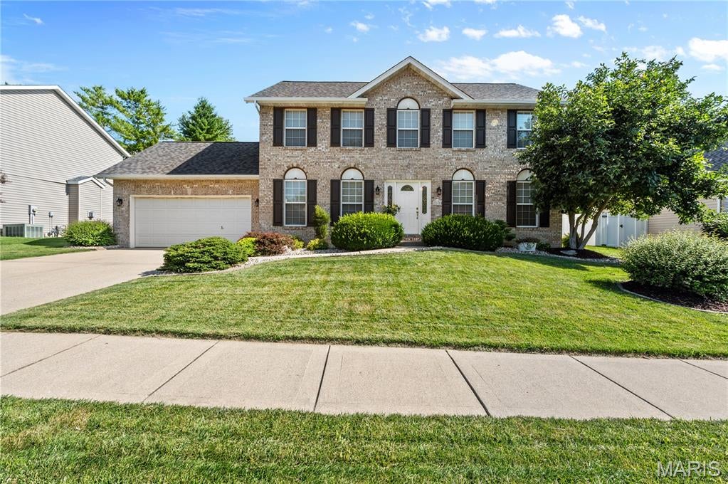Welcome home to this beautifully maintained 4-bedroom, 3-bath home, where timeless style meets thoughtful updates and exceptional outdoor living. From the moment you arrive, the beautifully landscaped front yard sets the tone for what awaits inside. The main level offers a comfortable and functional layout with an inviting family room featuring a fireplace, a spacious eat-in kitchen with newer appliances, a separate dining room, and a versatile flex room ready to become whatever you need—home office, playroom, sitting room, or hobby space. The thoughtfully updated interior blends classic finishes with modern touches for a timeless feel. Upstairs, the generously sized primary suite provides a peaceful retreat with a large walk-in closet and ensuite bath featuring a soaking tub and walk-in shower. Both the primary ensuite and secondary full bathroom were thoughtfully refreshed in 2026. Three additional bedrooms and convenient second-floor laundry complete the upper level. The washer and dryer stay, with the washer being new in 2026. The unfinished lower level offers even more potential, including a roughed-in area for a bathroom and endless possibilities for future living, recreation, storage, or entertaining space. Step outside and discover your own private backyard oasis. Beautiful landscaping surrounds a terraced patio and inviting fire pit area, creating the perfect setting for relaxing evenings, entertaining friends, or enjoying your morning coffee. The Tuff Shed stays, providing additional outdoor storage. Additional updates include a new roof in 2026, newer kitchen appliances, a new water heater in 2024, and a furnace new in 2021. A spacious two-car garage adds convenience and storage. With its thoughtful floor plan, timeless updates, generous living spaces, and stunning outdoor setting, this home has already passed Collinsville occupancy and is ready to welcome its next owners!