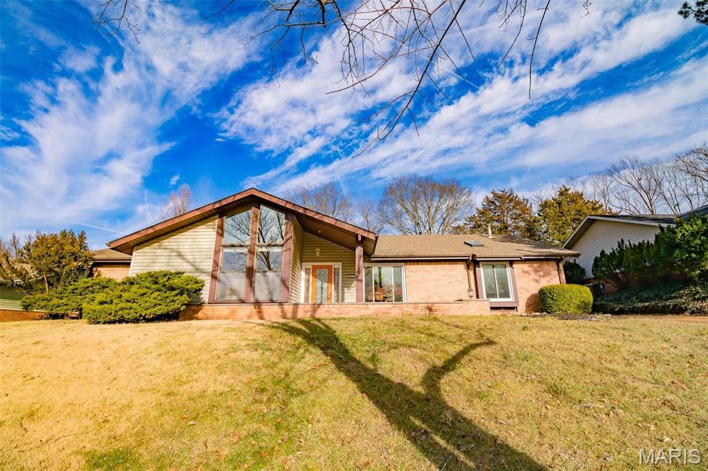 Fantastic opportunity to lease this 3 Bed, 2 full Bath ranch in Ballwin!  Wood floors throughout most of the living space, bedrooms are carpeted.  Updated kitchen with breakfast bar and stainless appliances, wood burning fireplace in family room, bonus room has main floor laundry and ample closet and storage.  Master bedroom has massive full bath and plenty of closet space, and has its own access to the deck in back.  Living room is spacious and bright with the windows and skylights.  2 car garage with extra storage space, massive deck, and level back yard round out this wonderful home.  This home does not have a basement.  No pets preferred, but may be considered with owner approval and additional deposit.  Available for occupancy mid September.  Only 12 months or greater term considered.