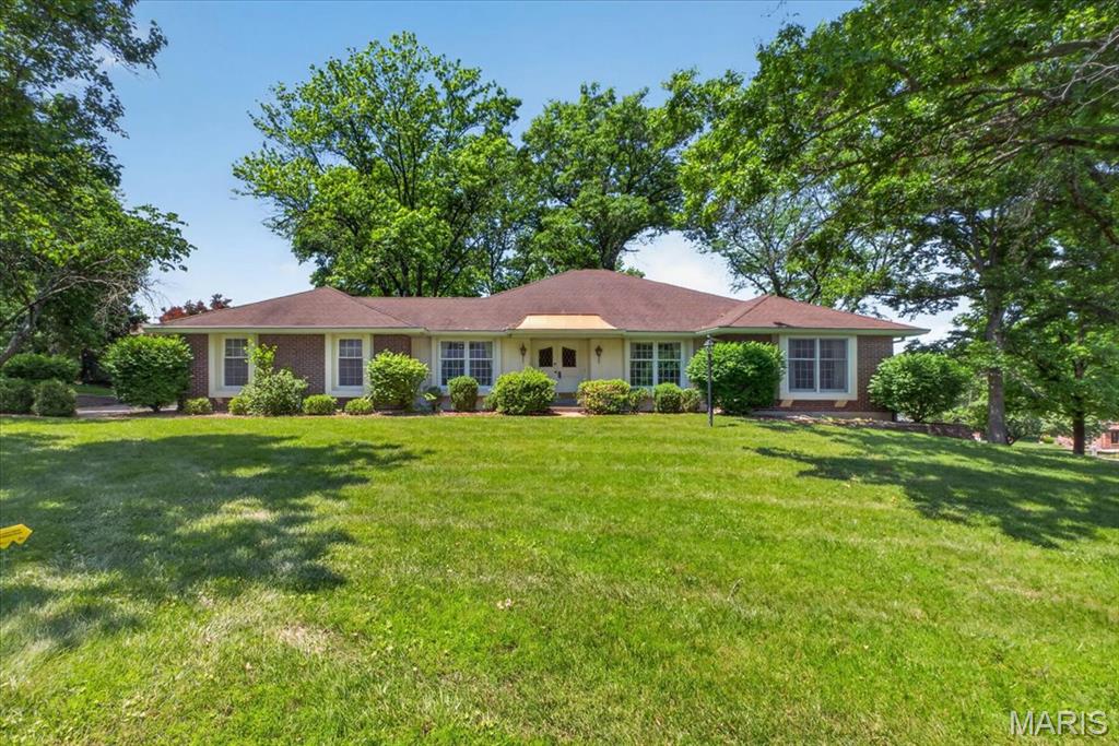 This 4 Bedroom, 3 bath,  2 car attached garage is in a sought after Creve Coeur subdivision off Ladue Rd. Beautiful new carpet installed 4/13/26. in Living Room, Dining Room and Main Floor Bedrooms.  Wood floors in entry foyer hallway and family room.  Doors leading to the patio flank the fireplace in the family room. There is plenty of storage in the lower level, a carpeted rec. room, 4th bedroom, bath, mini kitchen & office/sitting room with a door to the side yard.