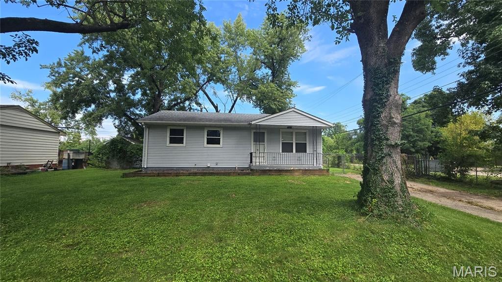Welcome home to this quiet retreat on an oversized 0.38 Acre lot! Inside, you'll find this 3-bedroom, 1-bath home offering a wonderful combination of comfort, character, and peaceful waterfront living.

Step outside to your fully fenced backyard and enjoy beautiful waterfront views of the Long Lake Extension, which runs directly behind the property. The spacious 16' x 12' wood deck, conveniently located just off the kitchen, is the perfect spot for morning coffee, summer gatherings, fishing, or simply unwinding while watching the ducks drift by. Boating and fishing are right in your backyard!

The spacious basement provides potential for a huge bonus space, complete with a cozy fireplace—perfect for a family room, entertaining area, or relaxing retreat. The basement also features an extra-large laundry, utility, storage area, along with a sump pump. Additional features include an attic fan and plenty of flexible space to make your own.

With its waterfront setting, generous outdoor space, useful updates, and inviting bonus areas, this home is ready to welcome its next owner!