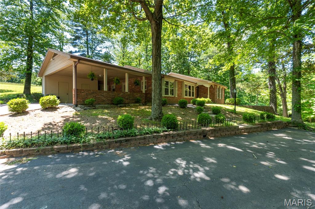 Spacious and private, this Ranch home sits in a park-like setting with beautiful hardwood floors throughout. The stunning breakfast nook features vaulted ceilings and a wall of windows that bring the outdoors in. The open-concept kitchen and family room create a perfect gathering space, while the main floor laundry offers plenty of cabinet storage. Situated on 4.5 acres just minutes from Cape in the Jackson School District, this property also includes a 30 x 50 shop/pole barn with 2 overhead doors. If you want privacy, convenience and a little slice of heaven, this is a must see.