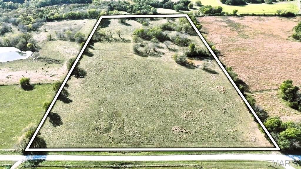 This 20.4-acre tract offers productive farm ground currently in pasture, with a nice balance of open land and wooded draws. The farm lays well, featuring mostly open acreage suitable for grazing or hay production, with the remaining timber providing natural cover and privacy. A pond adds value for livestock and wildlife. Tucked away at the end of a dead-end road, this secluded property offers a quiet rural setting while remaining functional for agricultural or recreational use. Additional acreage available totaling 98.09 acres.