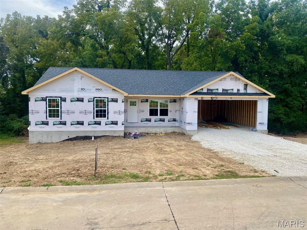 Back to Trees - Check. Flat Front Yard and Driveway - Check. Vaulted Ceiling - Check. Full Walk-out Basement - Check. Main-Floor Laundry - Check. That's right! Lots of boxes checked on this one! 3 bedrooms, 2 bathrooms, 2-car over-sized garage! Lamanite Flooring Throughout the Main Level! Kitchen offers 36" cabinets and breakfast bar! Double vanity and Walk-in Closet in primary suite! Hurry now and make some of the color selections today!
