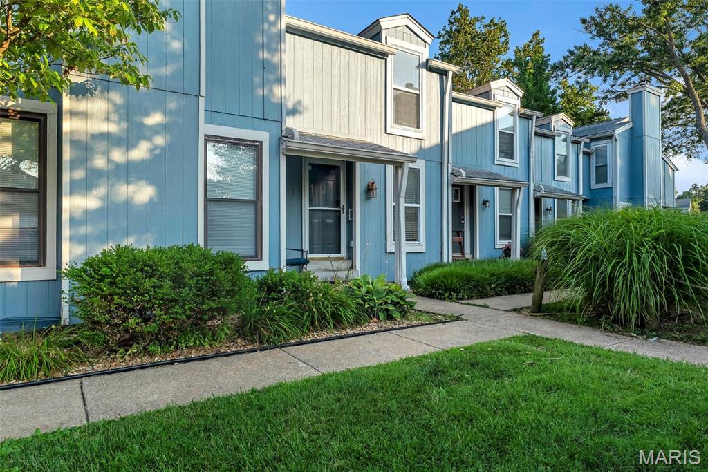 Lakefront Living Without the Lakefront Price - Enjoy the Harbor Town Lifestyle—Lake Views, Approximately 1,440 Finished Sq. Ft., and Exclusive Lake St. Louis Amenities! More than just a condo, this is a lifestyle! Just steps from the shores of Lake St. Louis, this well-maintained Harbor Town condo offers beautiful lake views and an exceptional opportunity to enjoy waterfront living at an affordable price.

This move-in ready 2-bedroom, 2-bath home has been lovingly maintained and offers a warm, inviting feel while providing the perfect opportunity to update and personalize over time. Vaulted ceilings in both bedrooms create an open, spacious atmosphere, while the living room and primary bedroom enjoy peaceful lake views. The primary bedroom features a custom closet organizer, and both bedrooms offer generous closet space. The main bath has been tastefully updated with ceramic tile and a tiled shower.

The main level features quality oak cabinetry, French doors, attractive woodwork, and a cozy gas fireplace. The finished lower level adds approximately 480 square feet of additional living space, making it ideal for guests, a home office, recreation room, or hobbies. It also features a full bath with a Jacuzzi tub and decorative glass block accents. A convenient kitchenette includes a refrigerator, bar sink, microwave, toaster oven, second dishwasher, cabinetry, workbench, and laundry area with washer and dryer—creating a wonderful space for entertaining, extended guests, or multi-generational living.

Harbor Town offers amenities that truly set it apart, including a private boardwalk, newly renovated beach, clubhouse, swimming pool, and boat slips available exclusively to Harbor Town owners. Ownership also includes access to all Lake St. Louis amenities, including golf, tennis courts, swimming pools, clubhouses, and more.

Whether you're searching for a full-time residence or a weekend retreat, this home offers an outstanding combination of space, location, and lifestyle. Clean, comfortable, and move-in ready today, it also provides the perfect opportunity to make it your own while building equity over time.

Join us for an Open House on July 18 during Harbor Town's Grand Opening celebration of the newly renovated beach! Tour the home, enjoy food and live music, meet Harbor Town residents, and hear updates from the Harbor Town Board and the Mayor of Lake Saint Louis while experiencing the exceptional waterfront lifestyle this community has to offer.