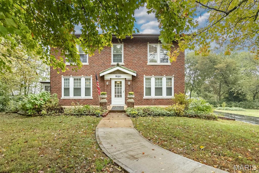 Own a piece of history! First time on market in 80 years! One of the original estates in Sunset Hills from 1922! Stately Entrance to this Updated Classic Brick 2 Story on 1.55 Acres in Prime Sunset Hills Location.  This Historic Home is Move in Ready! It features 5 Bedrooms with Private Balcony off the Primary Bedroom, 2 full and 2 half Baths, Beautiful Refinished 100 yr old Hardwoods through most of Home, Stain Glass Windows, Large eat in Kitchen/Breakfast room with 42" Cabinets, Living Room with Gas Fireplace & Stain Glass, Formal Dining room w/ Stain glass and Chandelier, Main Floor Laundry, Lower Level Family Room, Screened Porch, Detached 2.5 Car Garage with 2 carports, New roof, newer 200 amp Electric Panel, whole home freshly painted. Absolute Stunning Level 1.55 Acre lot. A Must See to Appreciate! Close to Highways & Shopping! Located in Top Ranked Lindbergh School District!
